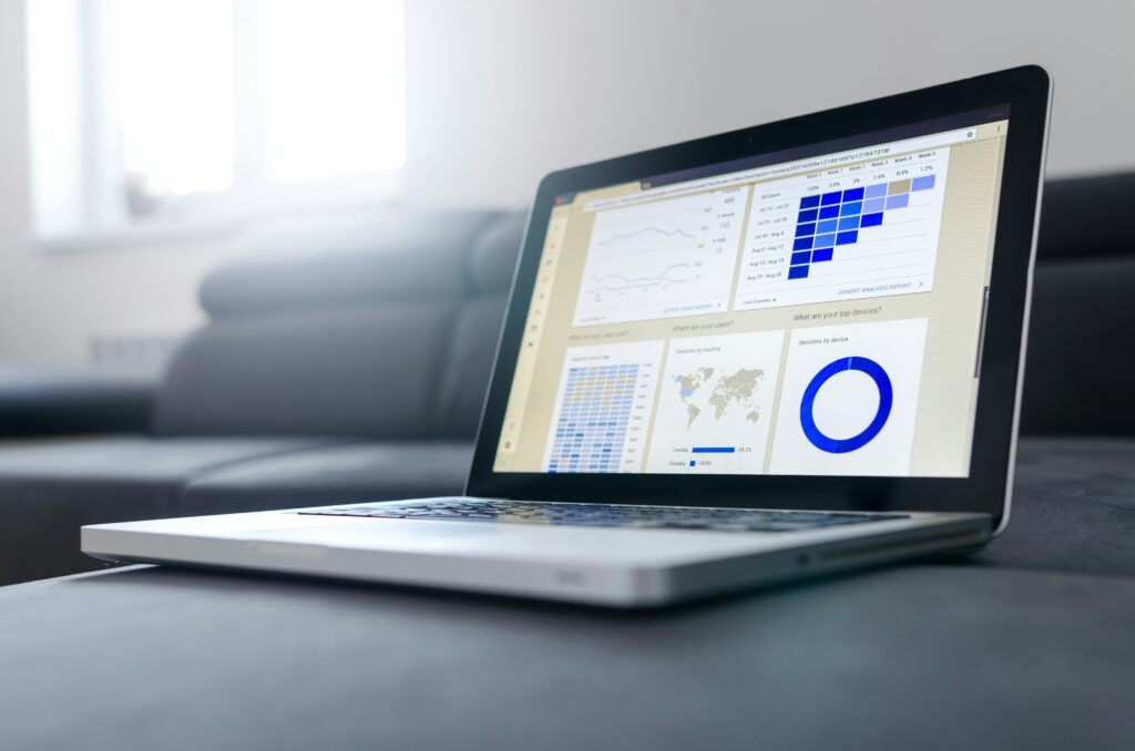 Laptop displaying charts and graphs.